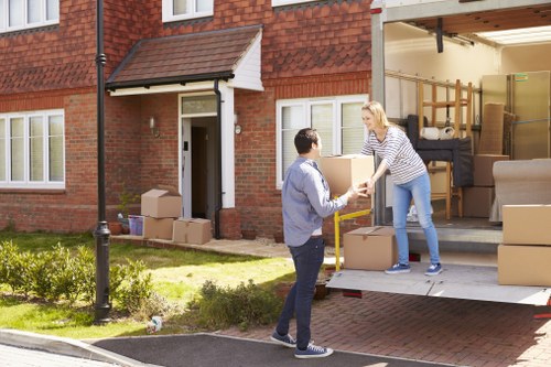 Loading furniture and boxes into a truck for a Hounslow move