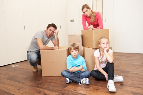Loading furniture and boxes into a van during a Hounslow house move