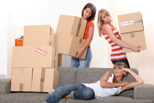 Staff coordinating safe unloading during a move